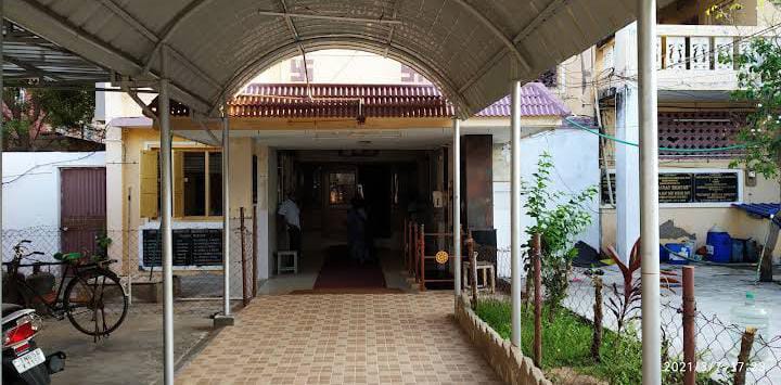 Covered entrance walkway leading into the Gujarat Bhavan building at Rameswaram
